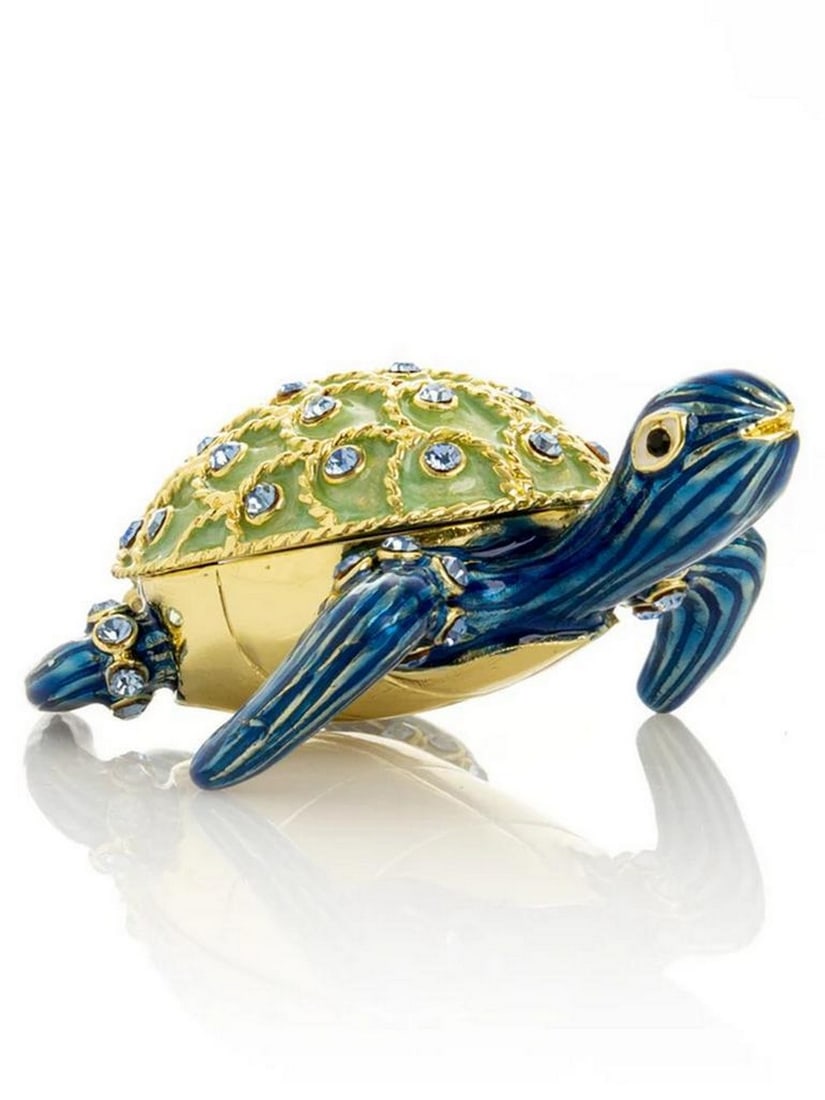 Emerald Turtle Trinket Box: Emerald Turtle Trinket Box This exquisite enamel-painted trinket box is a handcrafted piece adorned with handpicked Austrian crystals and finished with 24K gold plating. The piece is painted by hand u