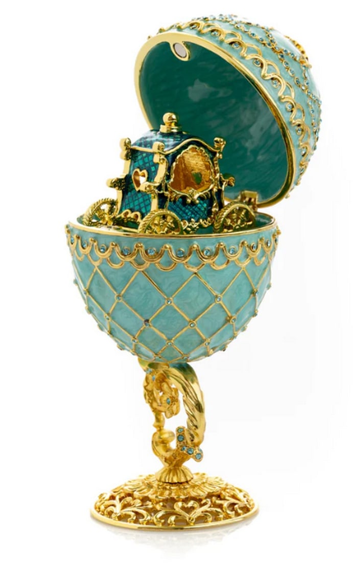 Regal Gold & Turquoise Egg with Carriage: Regal Gold & Turquoise Egg with Carriage Exquisite trinket boxes combine functionality with stunning decor, reflecting the grandeur of royal carriages throughout history. Once symbols of wealth and