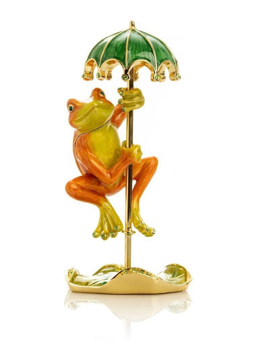 Frog with Umbrella Trinket Box 24K Gold Plated: Frog with Umbrella Trinket Box 24K Gold Plated This enamel-painted trinket box features a bright orange frog clinging to an umbrella, handcrafted and plated with 24K gold. Austrian crystals are handpi