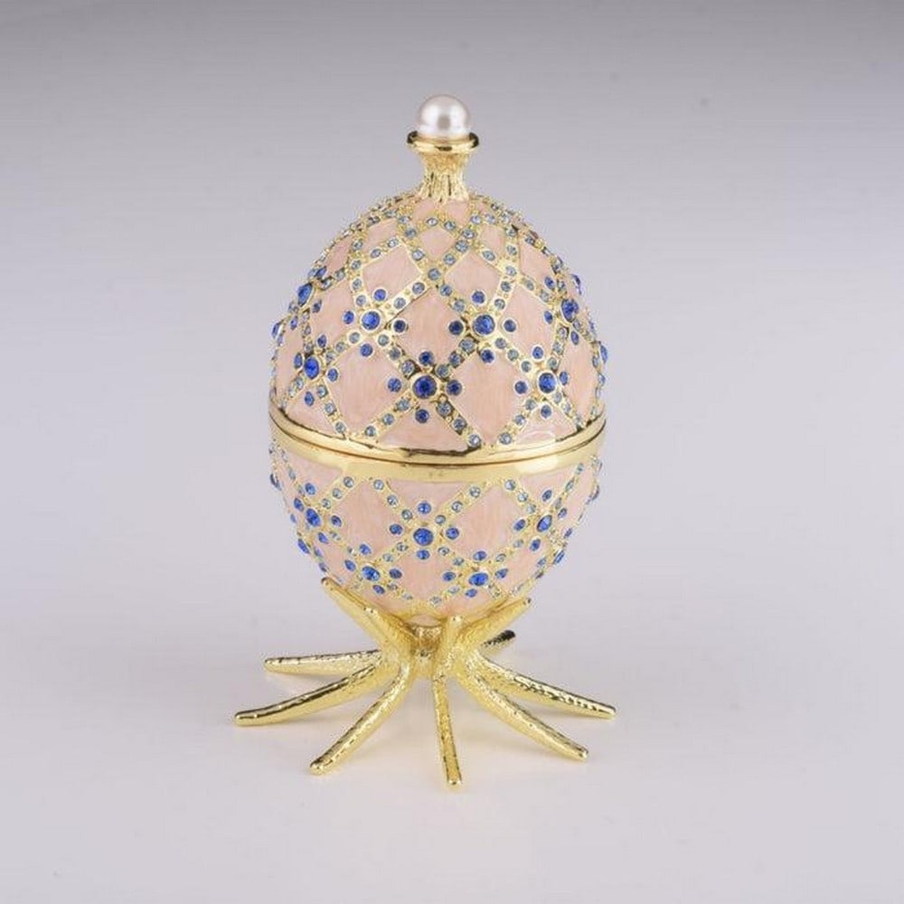 Pink Faberge Inspired Egg with Clock Inside: Pink Faberge Inspired Egg with Clock Inside Enamel Painted Trinket Box Decorated with Austrian Crystals. Plated with 24K Gold. Each crystal is handpicked and artistically placed on each piece. The tri
