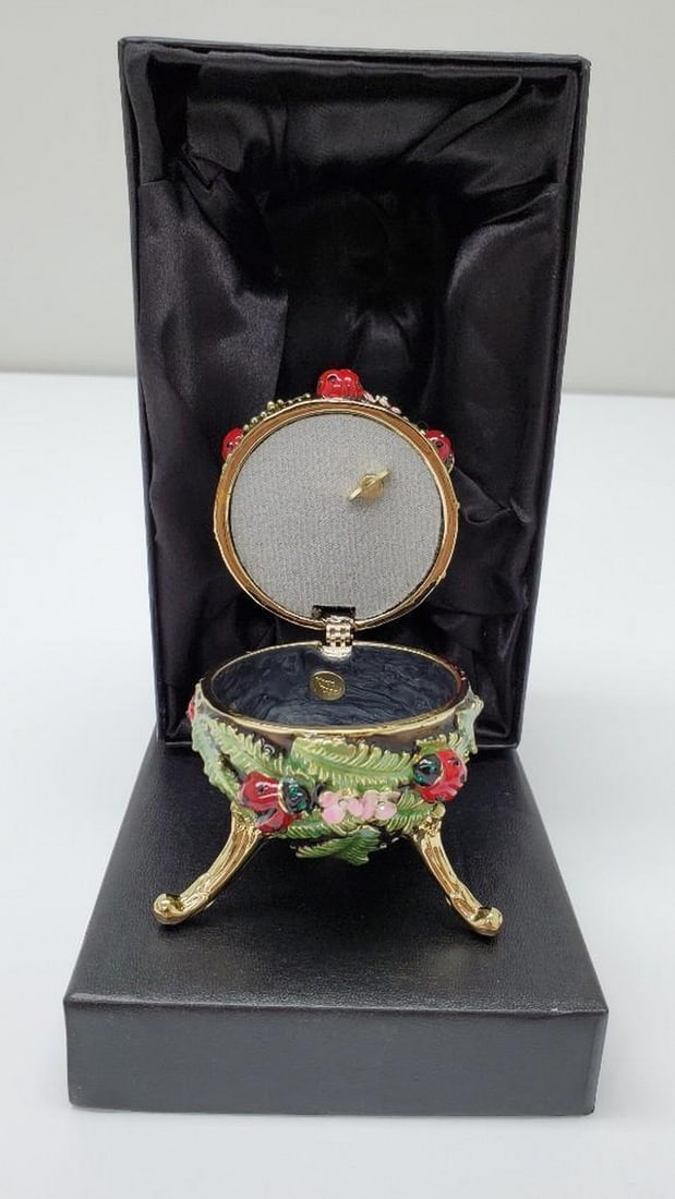 Enamel Painted Trinket Box Decorated with Austrian Crystals: Enamel Painted Trinket Box Decorated with Austrian Crystals A splendid handmade Green Faberge Egg with Ladybird Beetles Ladybugs Music Playing Trinket Box. This piece is a unique one of a kind piece m