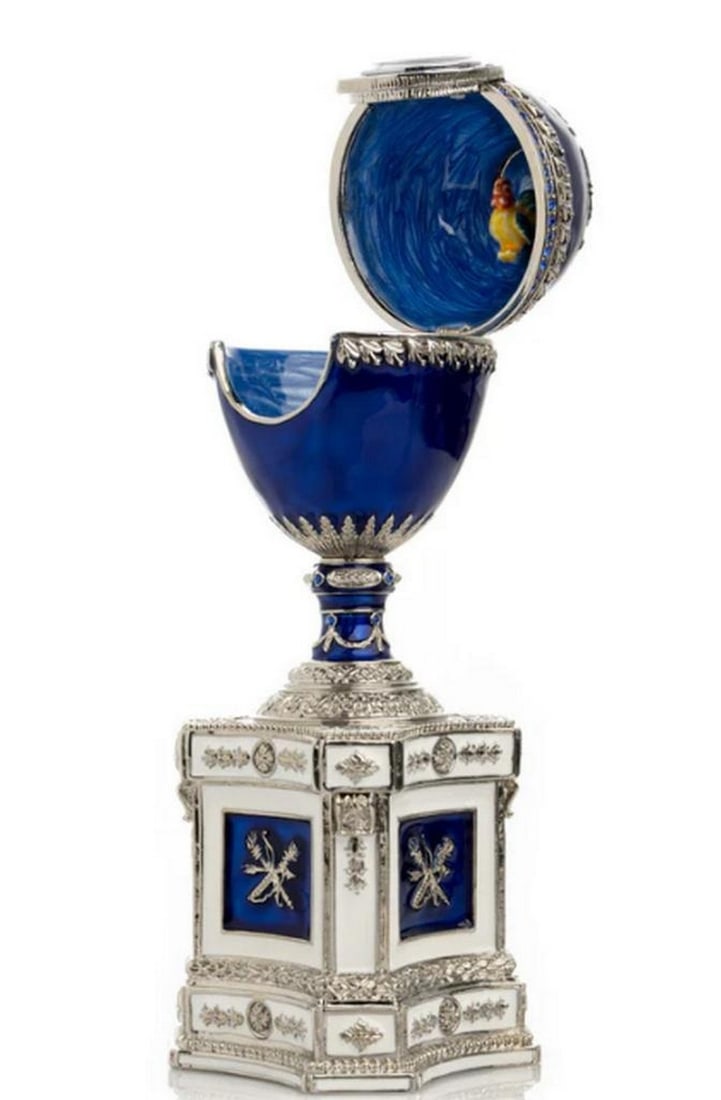 Timeless Elegance Blue Faberge Egg: Timeless Elegance Blue Faberge Egg This enamel-painted trinket box, adorned with handpicked Austrian crystals, is a stunning blend of artistry and elegance. Plated with 24K gold or 925 silver, each pi