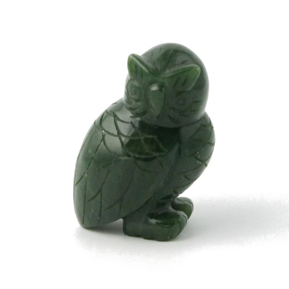 Canadian Nephrite Owl Jade Carving: Canadian Nephrite Owl Jade Carving Carved from rich green Canadian nephrite jade, this owl sculpture symbolizes wisdom, intuition, and protection. Intricately detailed with keen eyes and poised feathe
