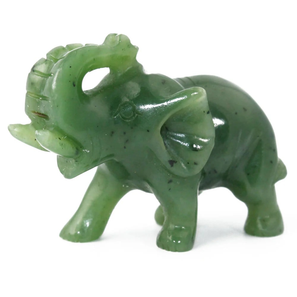 Canadian Nephrite Elephant Jade Statue: Canadian Nephrite Elephant Jade Statue This majestic elephant statue is carved from authentic Canadian nephrite jade, showcasing the stone's rich green tones and smooth finish. Representing wisdom, st