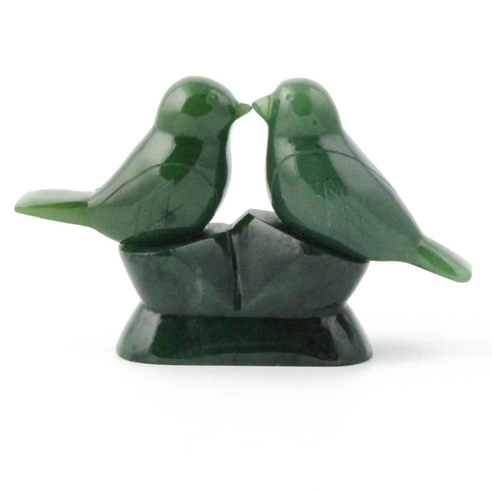 Canadian Nephrite Love Birds Jade Carving: Canadian Nephrite Love Birds Jade Carving This exquisite carving features a pair of love birds sculpted from rich green Canadian nephrite jade. Perched closely together, the birds symbolize harmony, f