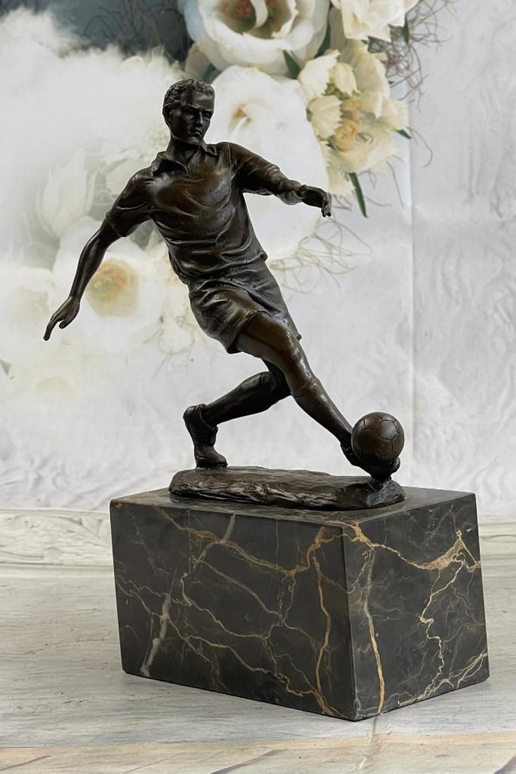 Original Soccer Player Bronze Sculpture - 9.5" x 7": Original Soccer Player Bronze Sculpture - 9.5" x 7" Behold the legendary presence on the field, captured in this remarkable bronze sculpture. Witness the soccer player as he gracefully tumbles
