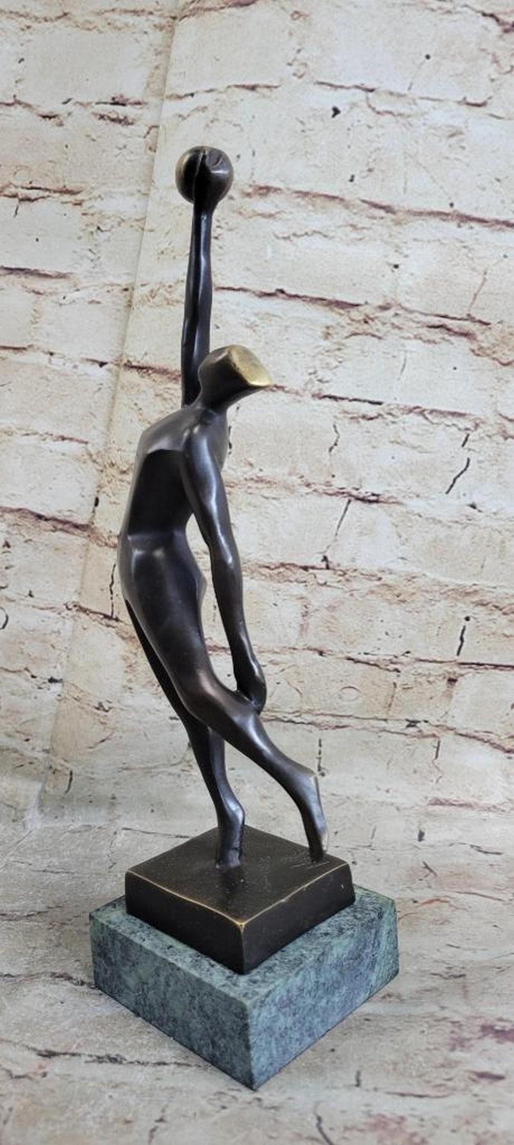 Signed Original Abstract Volleyball Player Bronze Sculpture - 12" x 3.5": Signed Original Abstract Volleyball Player Bronze Sculpture - 12" x 3.5" Abstract Volleyball player bronze figurines look lovely and leaves so much to the imagination as to the subjects' think