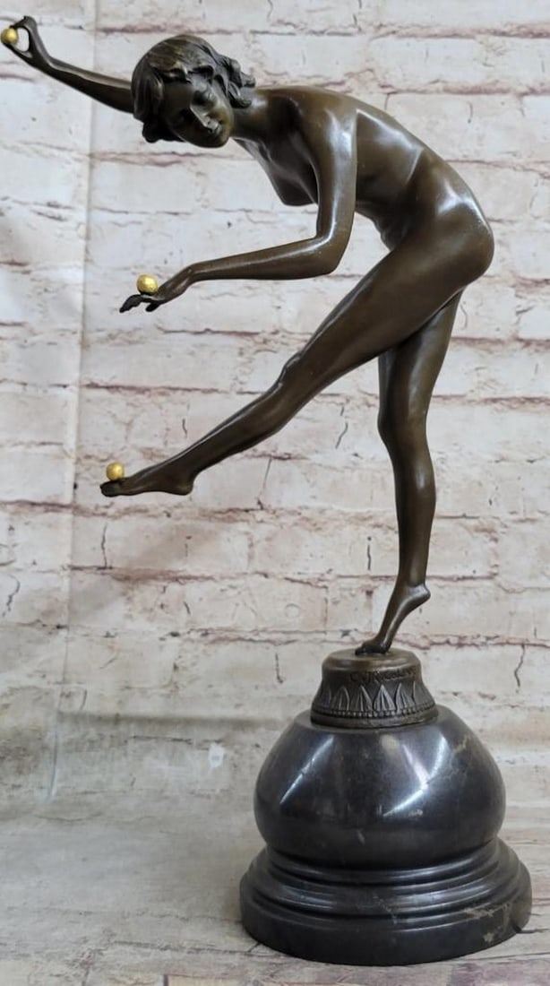 Colinet Inspired Juggling Balanced Acrobat Bronze Sculpture - 18.5" x 10": Colinet Inspired Juggling Balanced Acrobat Bronze Sculpture - 18.5" x 10" Introducing an exquisite Art Deco gilded bronze statue depicting a captivating girl skillfully juggling three balls. W