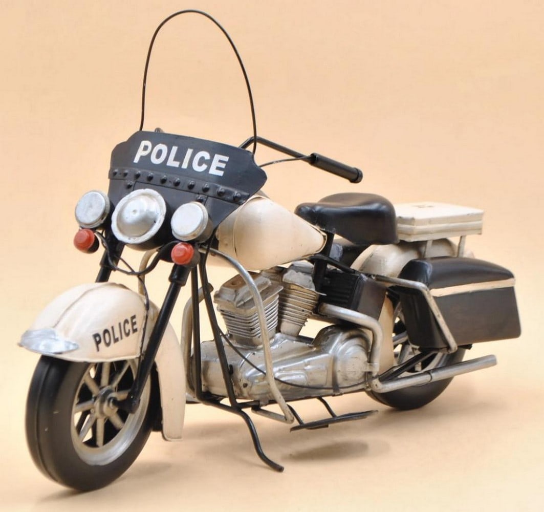 Die Cast 1978 Electra Glide Police Motorcycle: Die Cast 1978 Electra Glide Police Motorcycle Add sporty style to any space with our Rustic Iron 1978 Electra Glide Police Motorcycle Sculpture. Featuring a rustic iron frame and detailed craftsmanshi