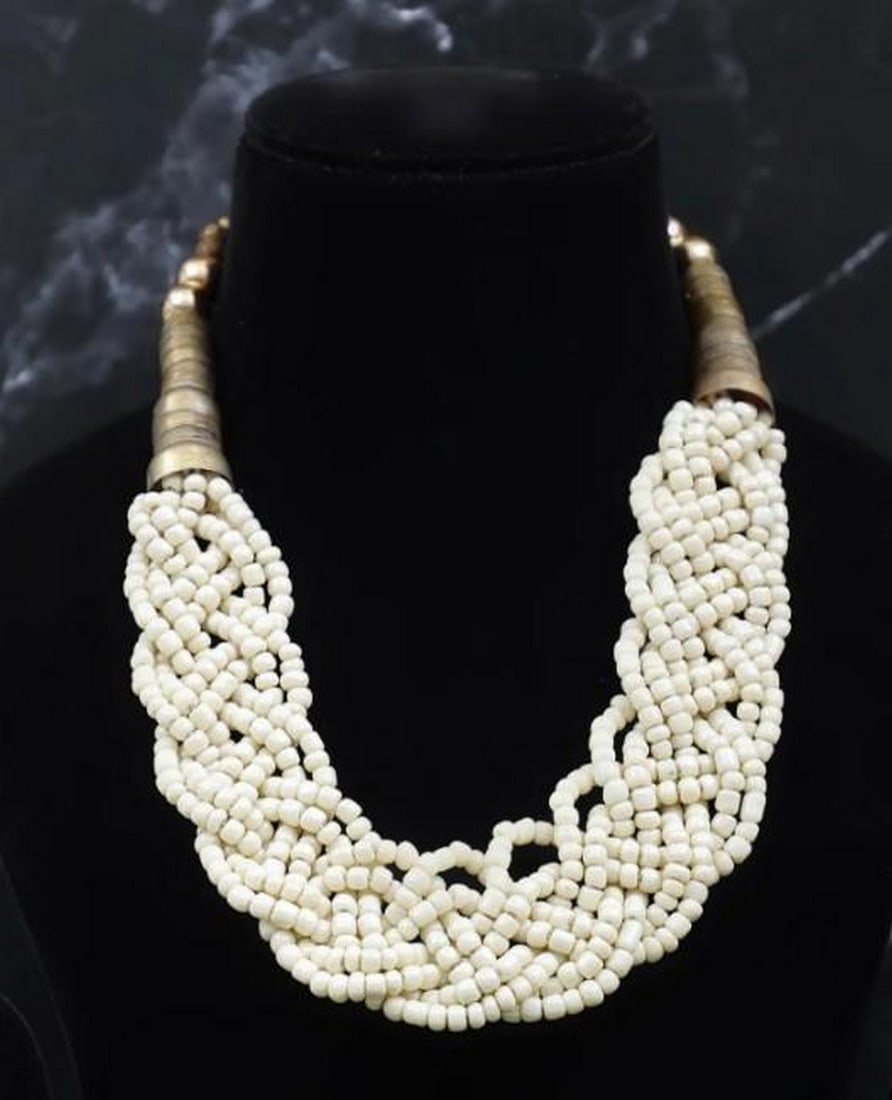 Boho Royale: Boho Royale - Contemporary Indian Braided Bead Necklace Add a vibrant and captivating touch to your wardrobe with this stunning beaded necklace. Handcrafted with care, this piece exudes a unique