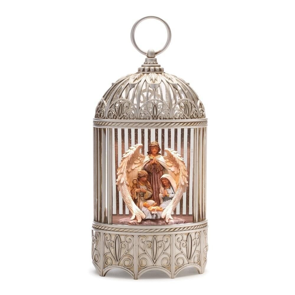 Heavenly Glow LED Nativity Snow Globe: Heavenly Glow LED Nativity Snow Globe Add a peaceful touch to your holiday decor with this LED Nativity Snow Globe. Mary, Joseph, and Baby Jesus, protected by an angel, are set inside a vintage