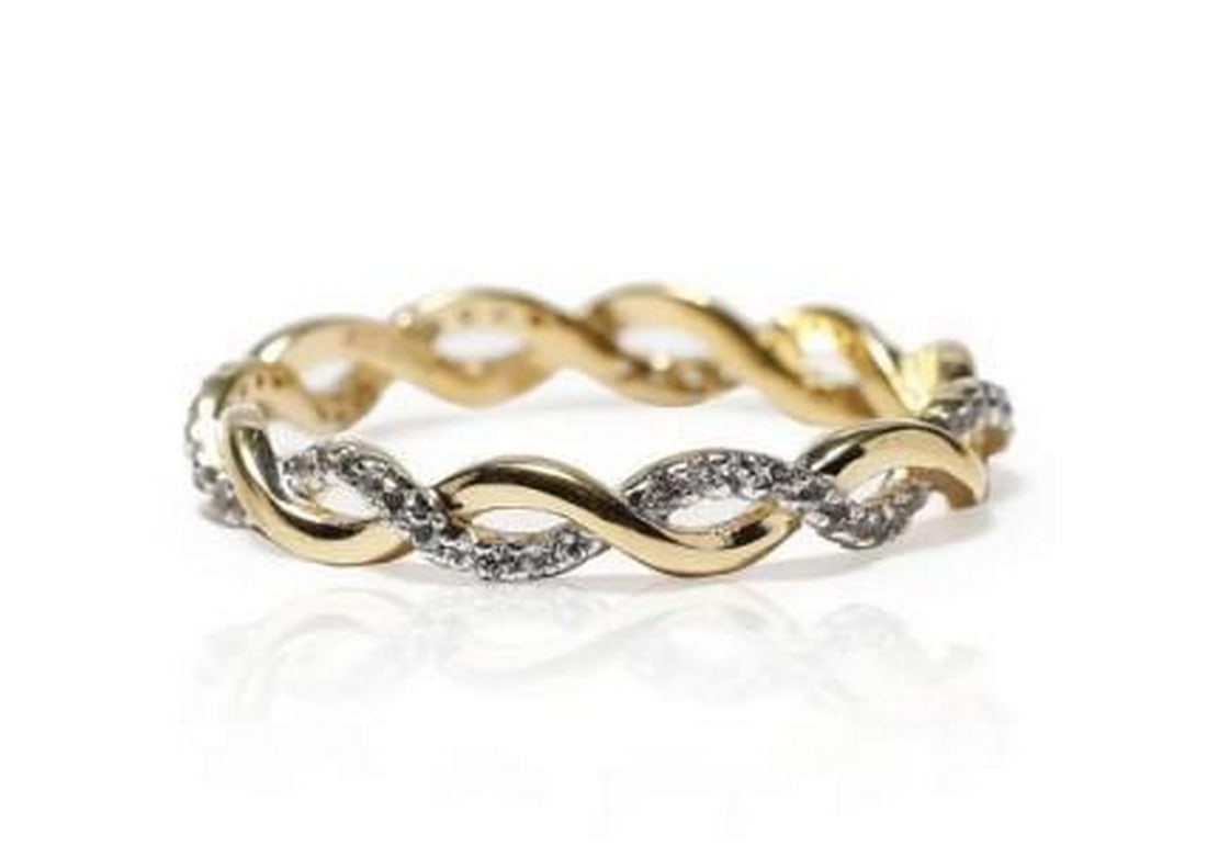 Luminous Twist: Luminous Twist - White Topaz Sterling Silver Ring Adorn your finger with the captivating beauty of our Sterling Silver Twisted Ring, meticulously crafted to exude sophistication and grace. This