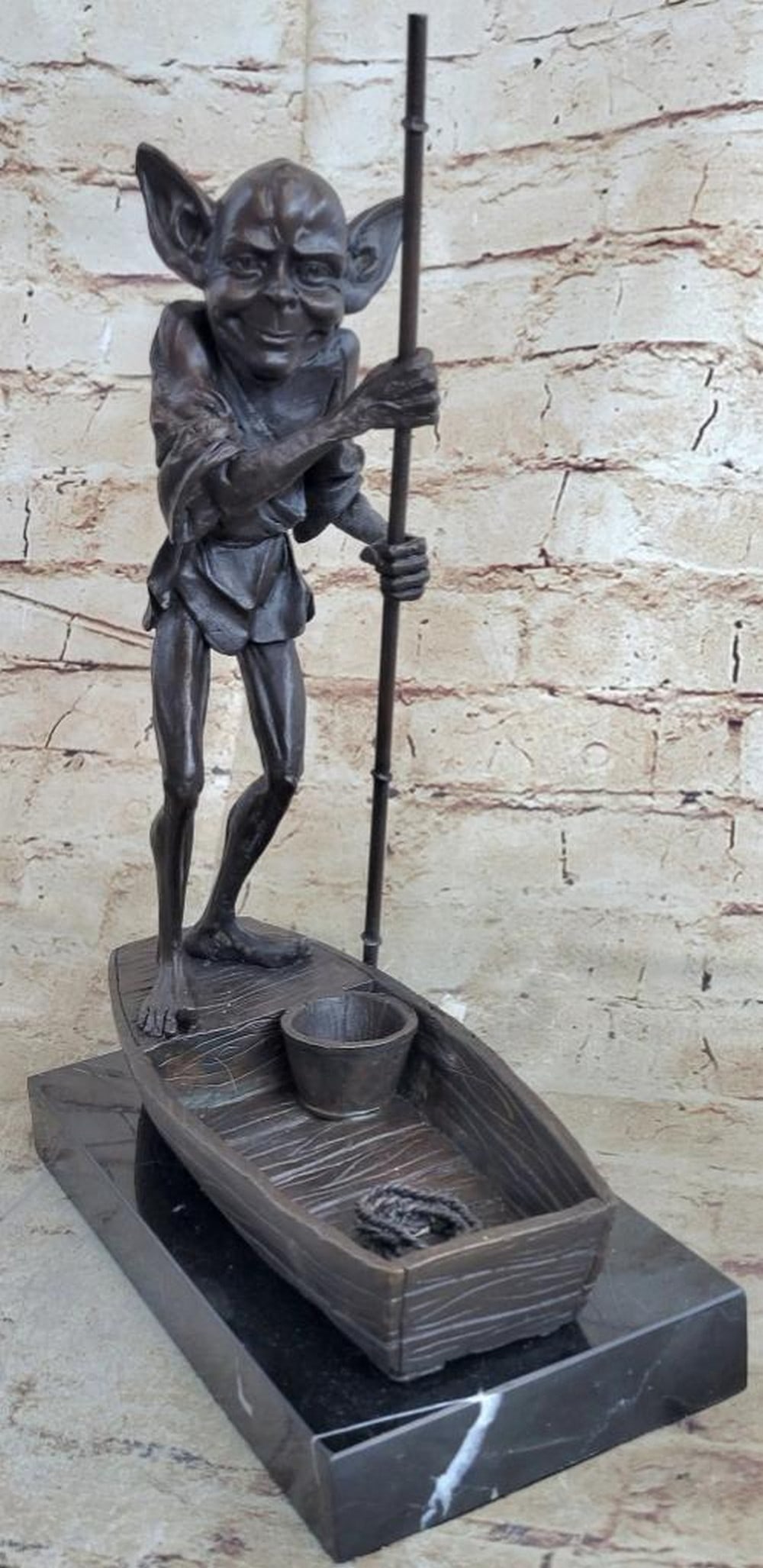 Fantasy-Inspired Bronze Figure by Milo - 14" x 9": Fantasy-Inspired Bronze Figure by Milo - 14" x 9" This original bronze sculpture presents a fantasy-inspired figure drawn from a well-known literary tradition, rendered with careful attention