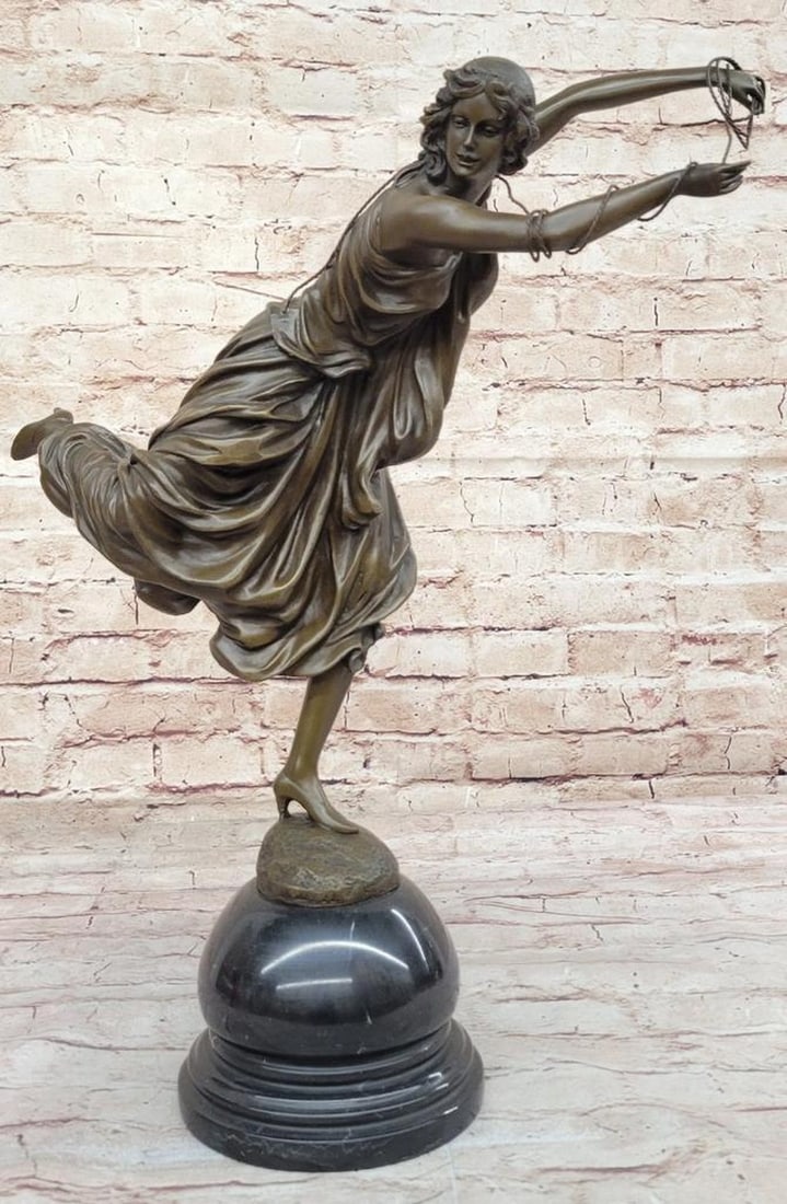 Art Deco Bronze Sculpture of Elegant Woman in High Heels & Flowing Dress - 19.5" x 16.5": Art Deco Bronze Sculpture of Elegant Woman in High Heels & Flowing Dress - 19.5" x 16.5" This exquisite bronze sculpture captures the elegance and movement of a woman in an elongated Art Deco 