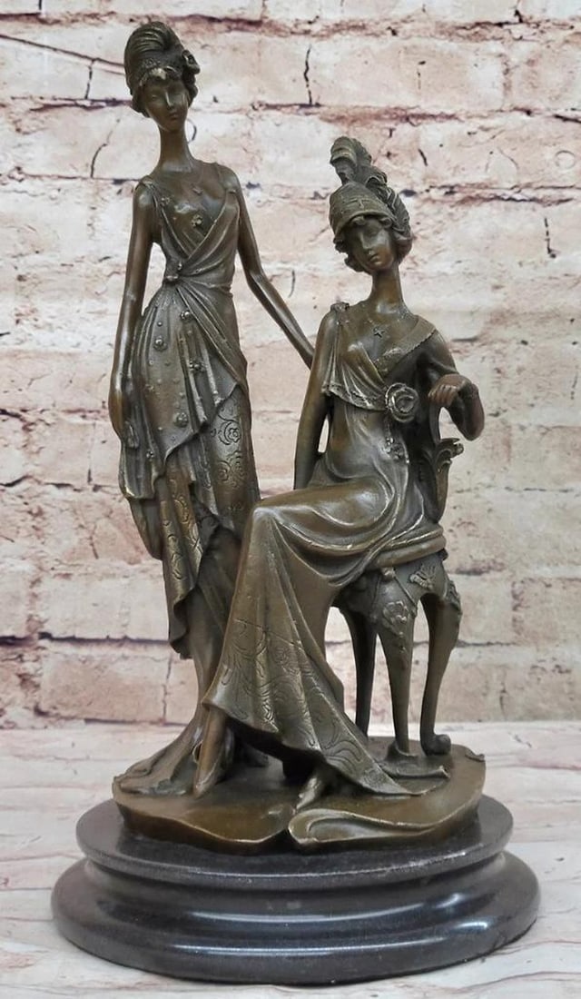 Gatsby Glamour: Inspired Bronze Sculpture of Two Women in 1920s Fashion by Mavchi - 14.5" x 8": Gatsby Glamour: Inspired Bronze Sculpture of Two Women in 1920s Fashion by Mavchi - 14.5" x 8" Step into the Roaring Twenties with this stunning bronze sculpture featuring two women, capturing