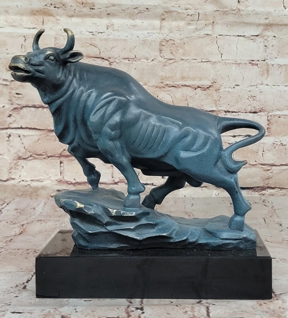 Power of the Bull Original Bronze Statue - 10" x 11": Power of the Bull Original Bronze Statue - 10" x 11" This bold bronze sculpture embodies the enduring symbol of strength and confidence - the iconic stock market bull. Poised with powerful mus