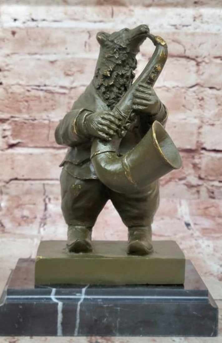 Bear Playing Saxophone Bronze Sculpture: Bear Playing Saxophone Bronze Sculpture This whimsical Bear Playing Saxophone Bronze Sculpture, inspired by the creativity of artist Williams, blends the charm of wildlife with the joy of music. The