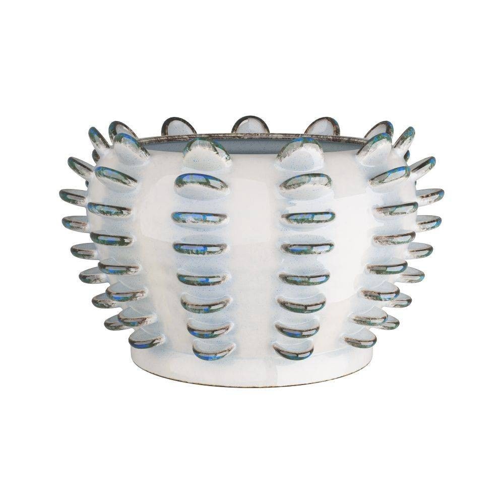 Reactive Blue, Ailee Collection Vase: Reactive Blue, Ailee Collection Vase Innovative form and artisanal craftsmanship, featuring a pristine white porcelain base that is set against a series of delicately arranged blue, oval-shaped protru