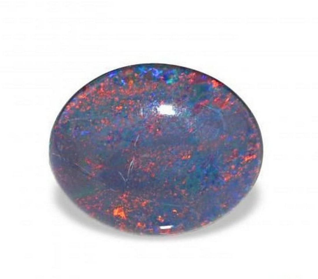2.40 ct Natural Multicolor Opal Triplet - Oval Cabochon: 2.40 ct Natural Multicolor Opal Triplet - Oval Cabochon Introducing the Natural Multicolor Opal Triplet, a captivating gemstone that displays a vibrant spectrum of colors across its surface. Its oval