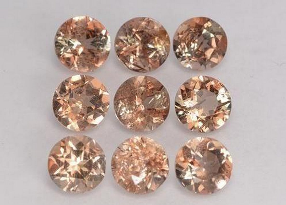 2.37ct Round Cut Andalusites: 2.37ct Round Cut Andalusites Specifications: Type: Andalusite Weight: 2.37 ct (total) avg. 0.26 ct Size: 4 mm calibrated Shape: Round Facet Color: Multicolor Clarity: VS-SI Treatment: Untreated