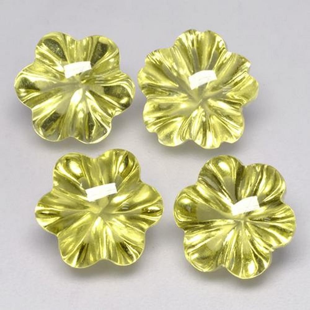 15.85 ct Flower-Cut Greenish Yellow Quartz Gemstones: 15.85 ct Flower-Cut Greenish Yellow Quartz Gemstones Introducing our set of four natural Greenish Yellow Quartz gemstones, totaling 15.85 ct, each carved into a delicate flower shape with an average w
