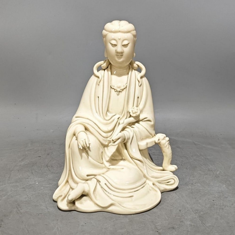 Inspired Ming Dynasty He Chaozong White Glaze Sculpture of Guanyin Buddha Statue: Inspired Ming Dynasty He Chaozong White Glaze Sculpture of Guanyin Buddha Statue This inspired Ming Dynasty He Chaozong sculpture of Guanyin Buddha is a stunning example of traditional Chinese craftsm