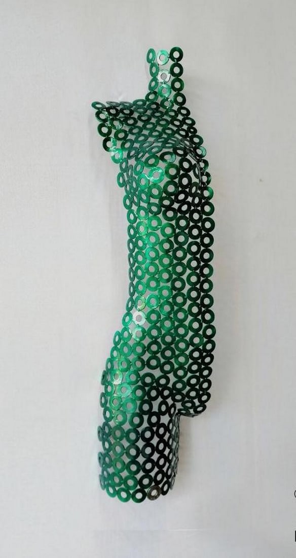 'Half of Me'' Green Metallic Sculpture: Half of Me Green Metallic Sculpture This stunning abstract metal torso sculpture of a woman is meticulously handcrafted, with each piece welded to achieve its elegant form. Life-size and finished with