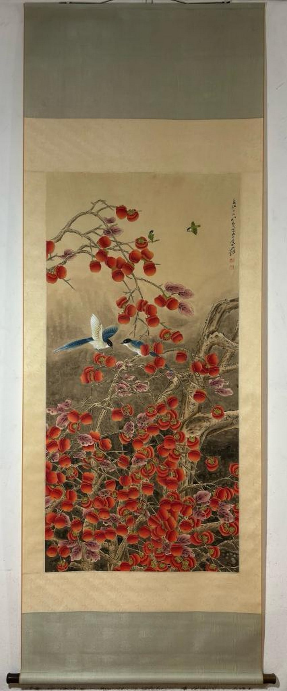 Inspired Persimmon Blossoms in Bloom Scroll Painting: Inspired Persimmon Blossoms in Bloom Scroll Painting In this vibrant scroll painting inspired by Zhang Daqian, lively azure-winged magpies flit among blooming persimmon branches, some mid-flight, othe