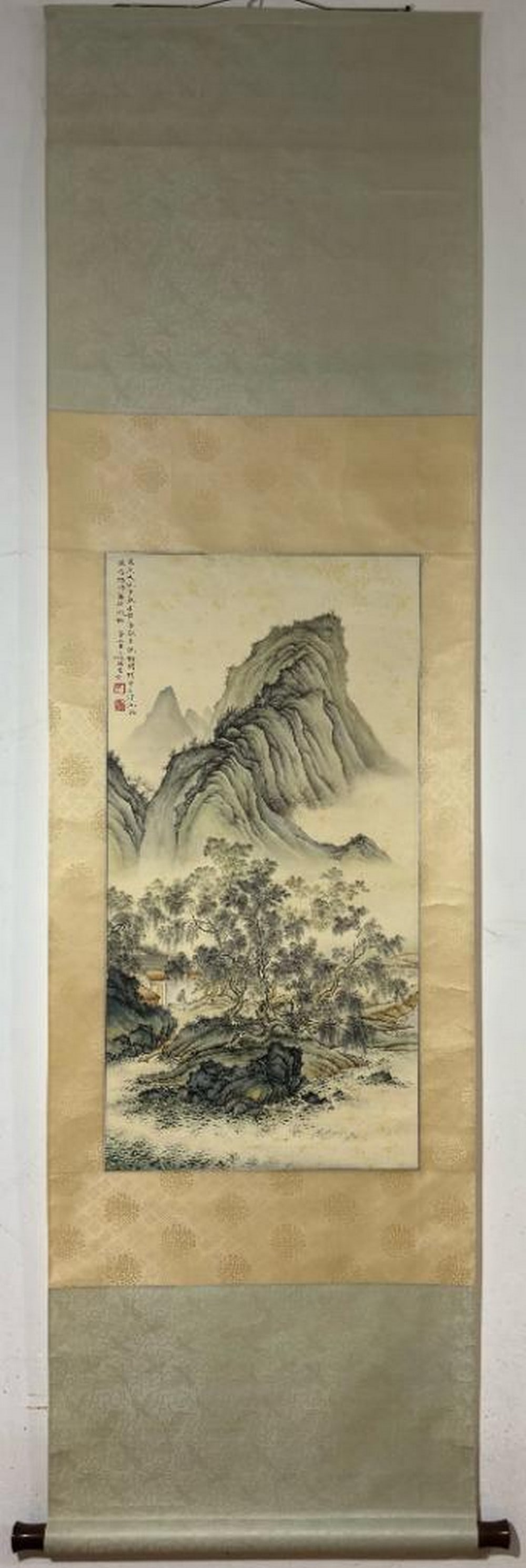 Hand-Painted Landscape Scroll: Hand-Painted Landscape Scroll This stunning hand-painted landscape scroll inspired by renowned artist Chen Shaomei captures a serene and peaceful scene of a small house nestled among trees, set agains
