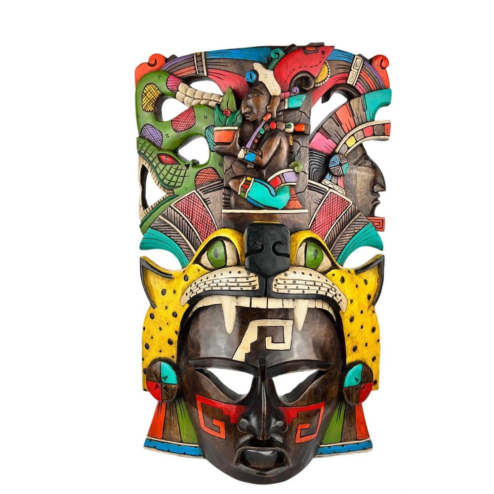 Hand Carved Mayan Maize God Mask: Hand Carved Mayan Maize God Mask This vibrant Mayan mask features intricate designs, with the maize god portrayed as a young man wearing an ear of corn as his headdress. Its colorful details bring an 