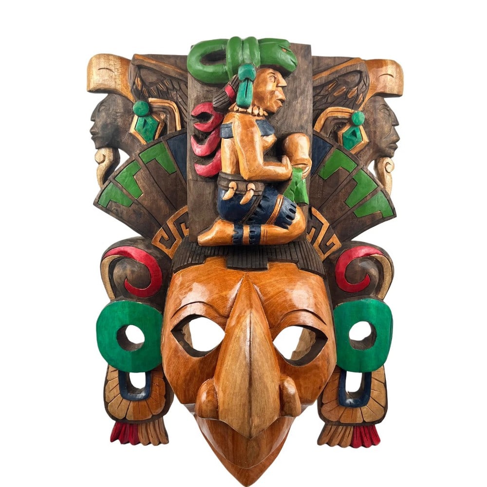 Hand Carved Mask of Medicine and Midwifery: Hand Carved Mask of Medicine and Midwifery This vibrant mask showcases a striking blend of colors, adding a unique and captivating touch to any space in your home. It features the face of King Pakal, 