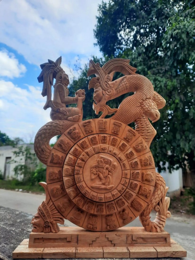 Hand Crafted Mayan and Aztec Calendar Carving: Hand Crafted Mayan and Aztec Calendar Carving This handcrafted Mayan Calendar features three intricately designed rotational wheels, each representing a distinct yet interconnected system: the Long Co