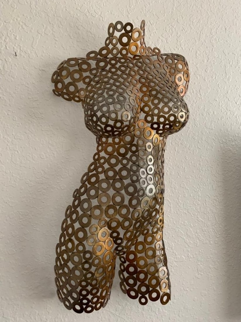 Earth Harmony Torso Sculpture: Earth Harmony Torso Sculpture This stunning female torso sculpture embodies the perfect blend of texture and form, hand-formed and welded with expert precision. The meticulously polished and ground de