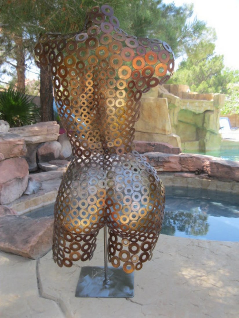 Auburn Essence Torso Sculpture: Auburn Essence Torso Sculpture This magnificent female metal art torso showcases the perfect fusion of form, texture, and color. Hand-formed and welded with precision, the fine-textured details are me