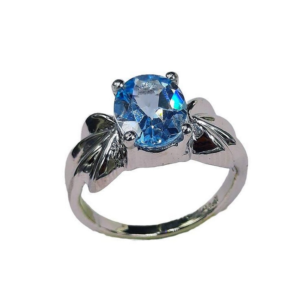 Sterling Silver Blue Topaz Stone Ring: Sterling Silver Blue Topaz Stone Ring Inner Diameter: 18mm View Photos For Further Details