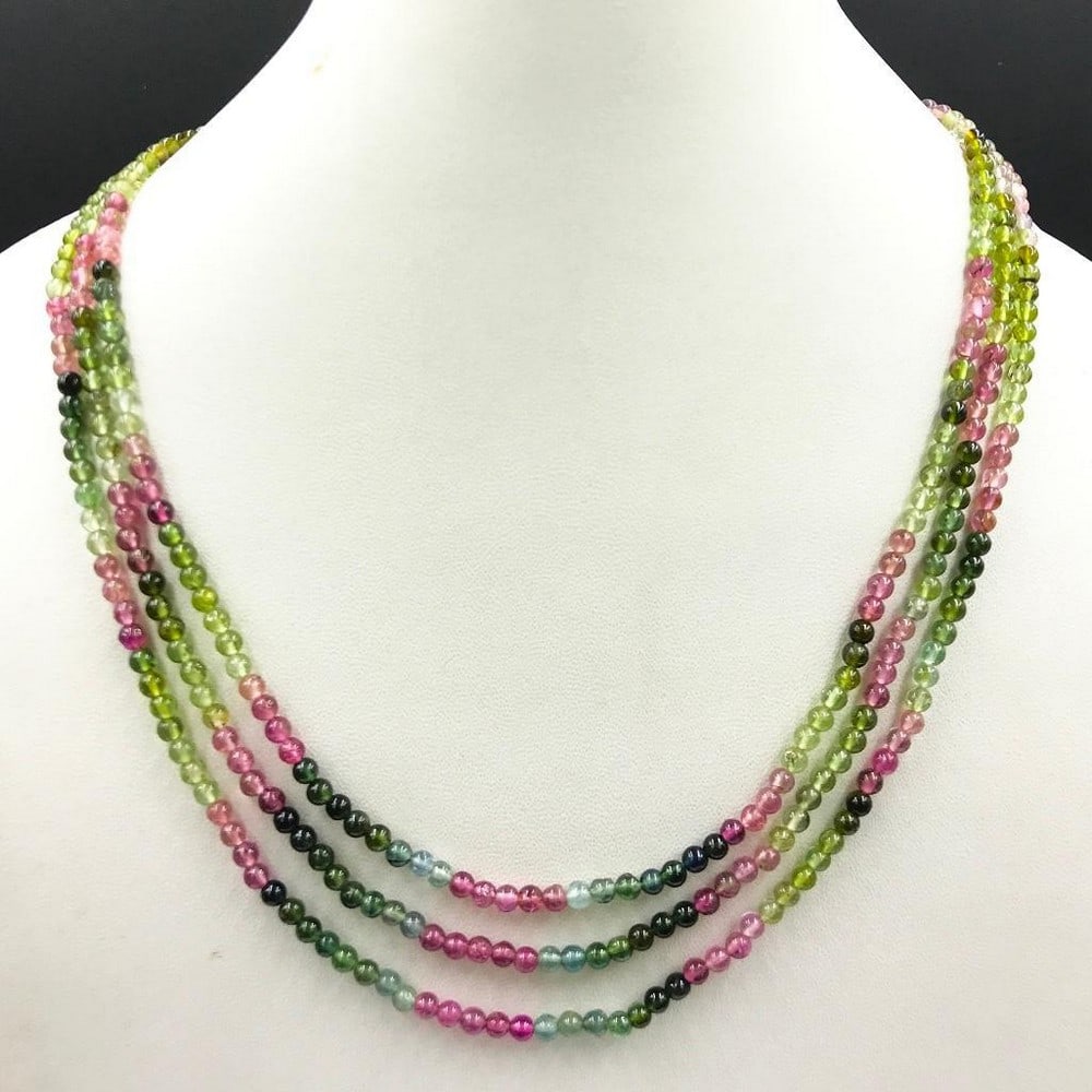 Multi Coloured Tourmaline Round Bead 3 Strand Necklace: Multi Coloured Tourmaline Round Bead 3 Strand Necklace Bead Diameter 3.5mm Necklace Length: 42cm Weight in Carats: 126.4 View Photos For Further Details