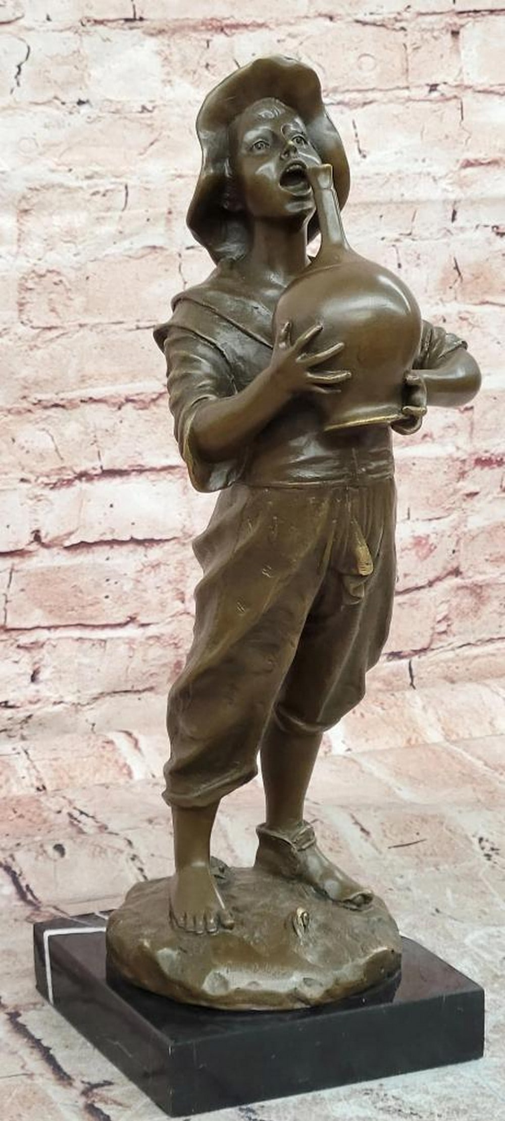 Boy with Wine Jug Bronze Sculpture in the Manner of Paul Dubois - 16'' x 5.5'': Boy with Wine Jug Bronze Sculpture in the Manner of Paul Dubois - 16'' x 5.5'' Introducing a Classical Bronze Sculpture: This figure of a young boy carrying a wine jug is meticulously handcrafted with