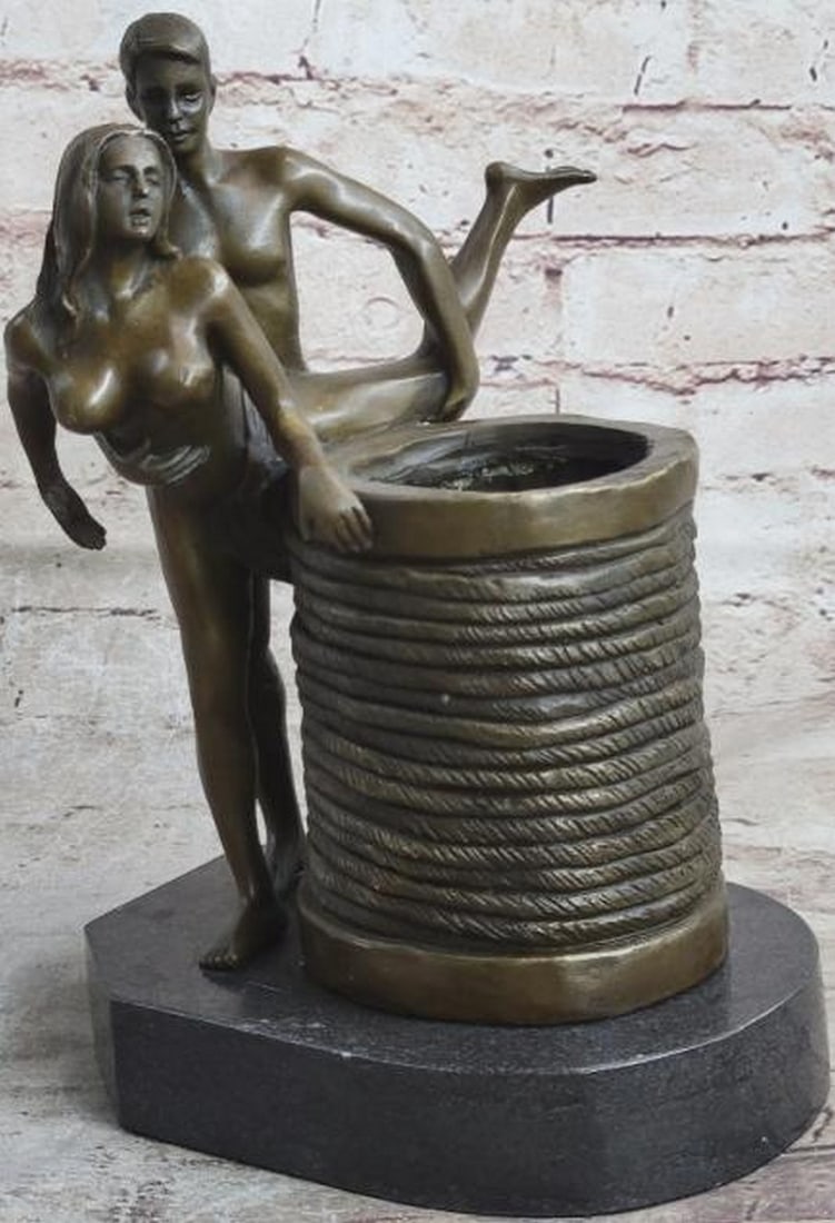 Passion's Embrace Bronze Sculpture Pen Holder Nude Figures: Passion's Embrace Bronze Sculpture Pen Holder Nude Figures This is an original bronze sculpture inspired by and bearing the signature of artist Mavchi. A bold fusion of functionality and sensual artis