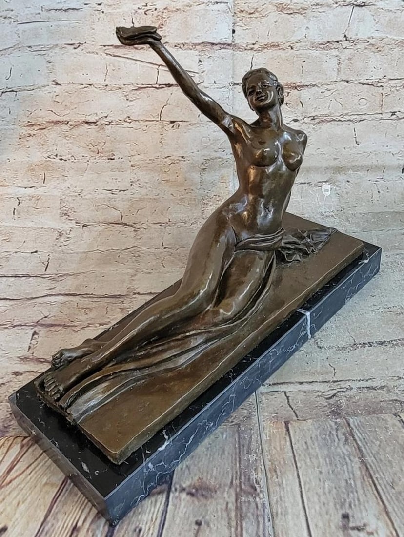 The Bird in Hand Bronze Sculpture - 10'' x 13'': The Bird in Hand Bronze Sculpture - 10'' x 13'' This sculpture is a perfect beauty composition. '' The Bird in Hand'' was created by A. Gennarelli and is one of his best known sculptures. The bronze f