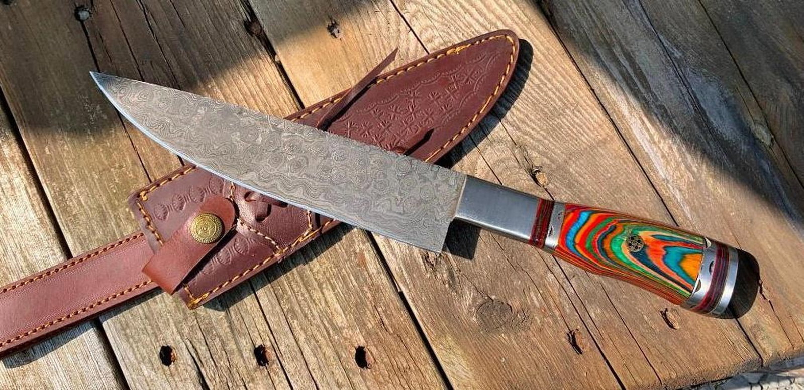 13'' The Outback Damascus Chef's Knife: 13'' The Outback Damascus Chef s Knife Introducing our Custom Handmade Damascus Steel Hunting Chef Knife, a culinary masterpiece that seamlessly blends artistry and functionality. The multi-color wood