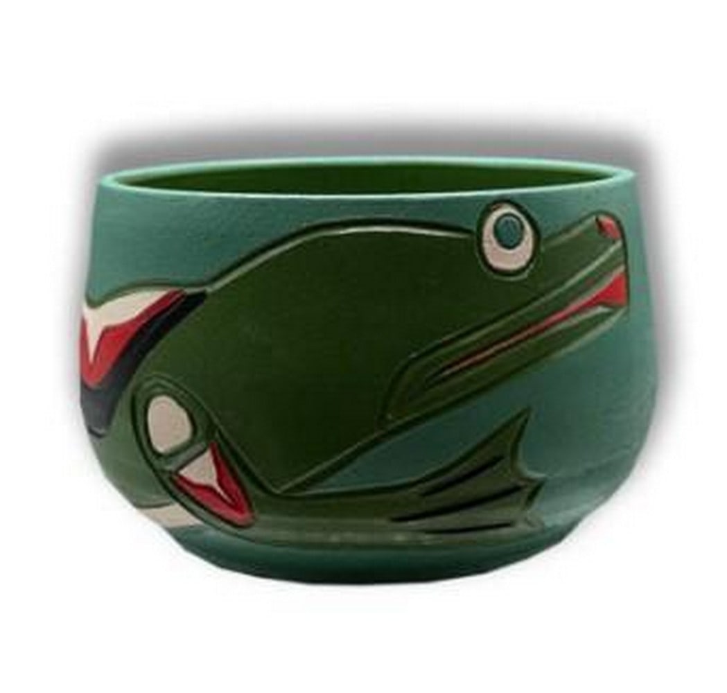 Green Leap Ceramic Bowl: Green Leap Ceramic Bowl This handcrafted ceramic bowl draws inspiration from indigenous artistry, featuring intricate patterns and earthy tones that reflect a deep connection to nature and cultural