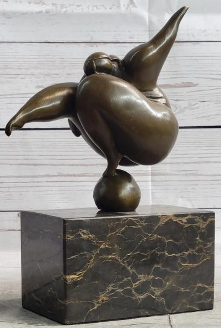Grace in Motion Bronze Sculpture: Grace in Motion Bronze Sculpture This dynamic bronze sculpture, bearing the signature of artist Milo, celebrates strength, balance, and body-positive beauty through abstract form. The curvaceous BBW f