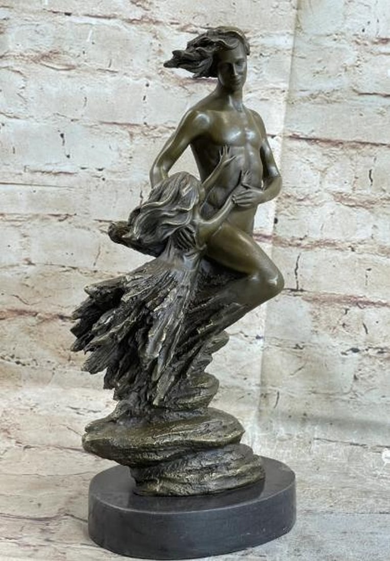 Lifted by the Wind: Bronze Sculpture: Lifted by the Wind: Bronze Sculpture Poetic and weightless, this bronze sculpture, bearing the signature of artist Aldo Vitaleh, depicts a moving scene of human connection and transcendence. A man app