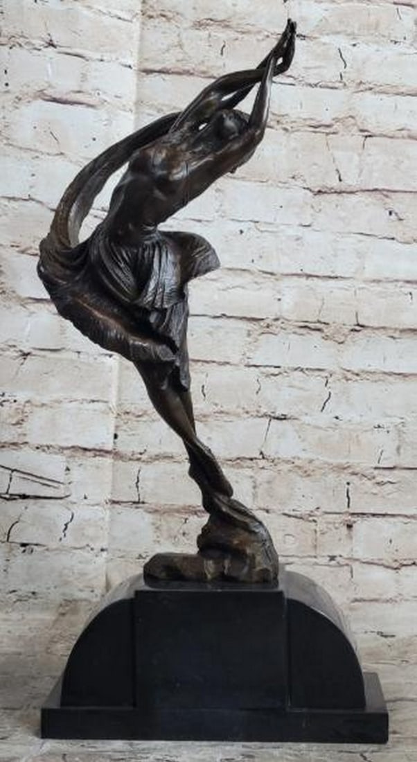 Flight in Motion Leaping Dancer Bronze Sculpture: Flight in Motion Leaping Dancer Bronze Sculpture A dynamic and graceful bronze sculpture capturing the spirit of dance in mid-air. Mounted on a polished marble base and bearing the signature of artist