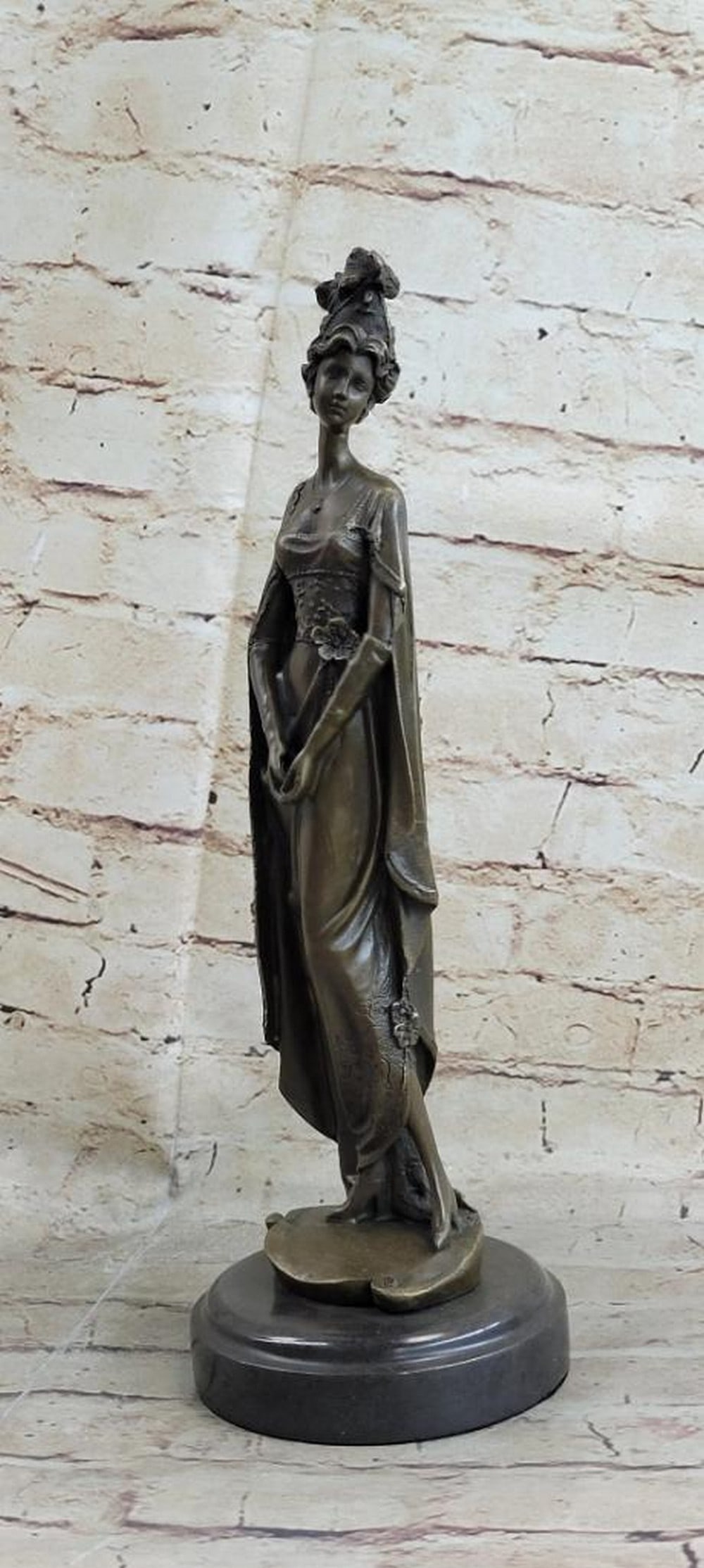 Classic Victorian Woman Bronze Statue on a Marble Base - 14" x 4.5": Classic Victorian Woman Bronze Statue on a Marble Base - 14" x 4.5" This unique sculpture of a 1920`s woman with four feathers in her right hand standing proudly for the silent era. Her