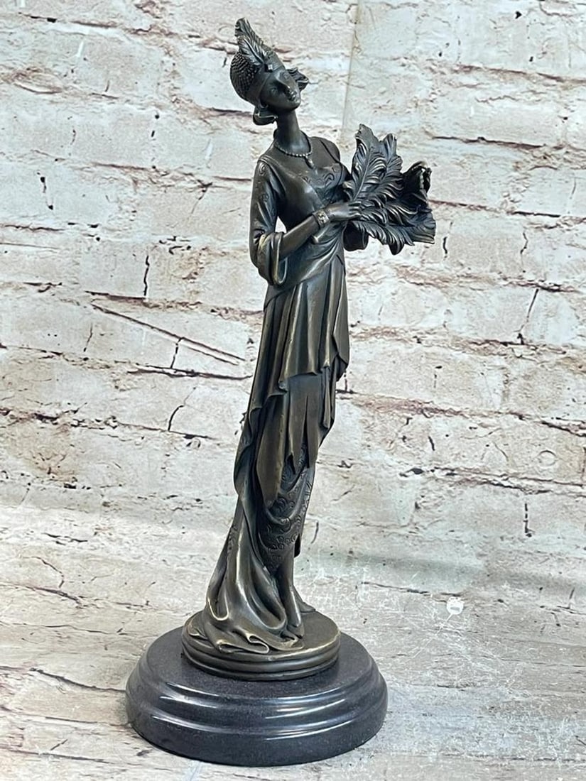 Art Deco Bronze Sculpture of a Poised Woman with Feathers - 14" x 5": Art Deco Bronze Sculpture of a Poised Woman with Feathers - 14" x 5" Step into the glamour of the 1920s with this exquisite bronze sculpture of a poised woman elegantly holding four feathers i