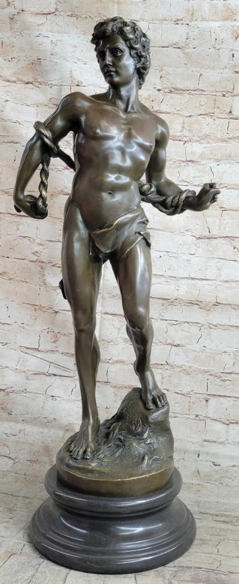Bronze Sculpture of David Muscular Male Figure Reproduction by Michelangelo - 26" x 12": Bronze Sculpture of David Muscular Male Figure Reproduction by Michelangelo - 26" x 12" This impressive bronze sculpture captures the iconic figure of David, highlighting his muscular