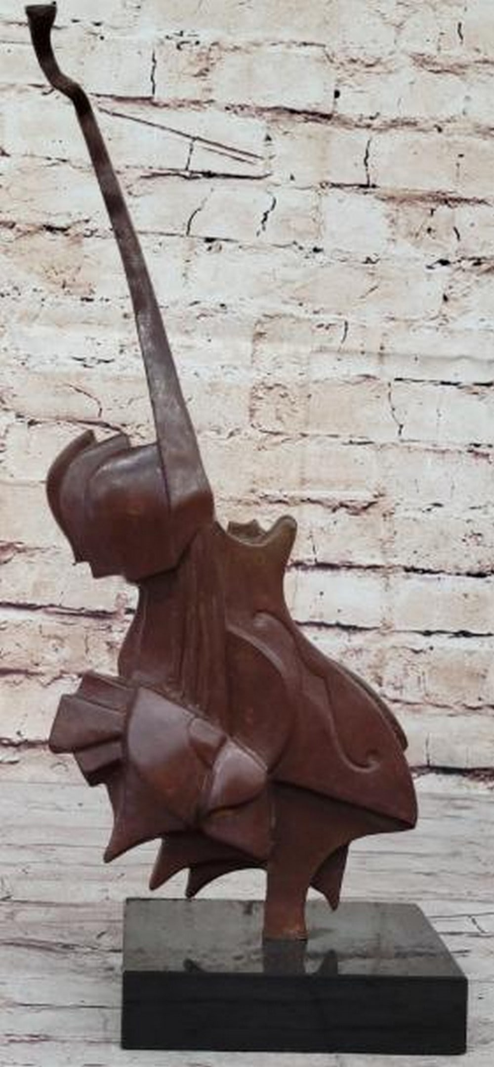 Echoes of Surrealism: Abstract Guitar Bronze Sculpture Reproduction: Echoes of Surrealism: Abstract Guitar Bronze Sculpture Reproduction Inspired by Salvador Dali's visionary interpretation of musical form, this abstract reproduction bronze sculpture reimagines the gui