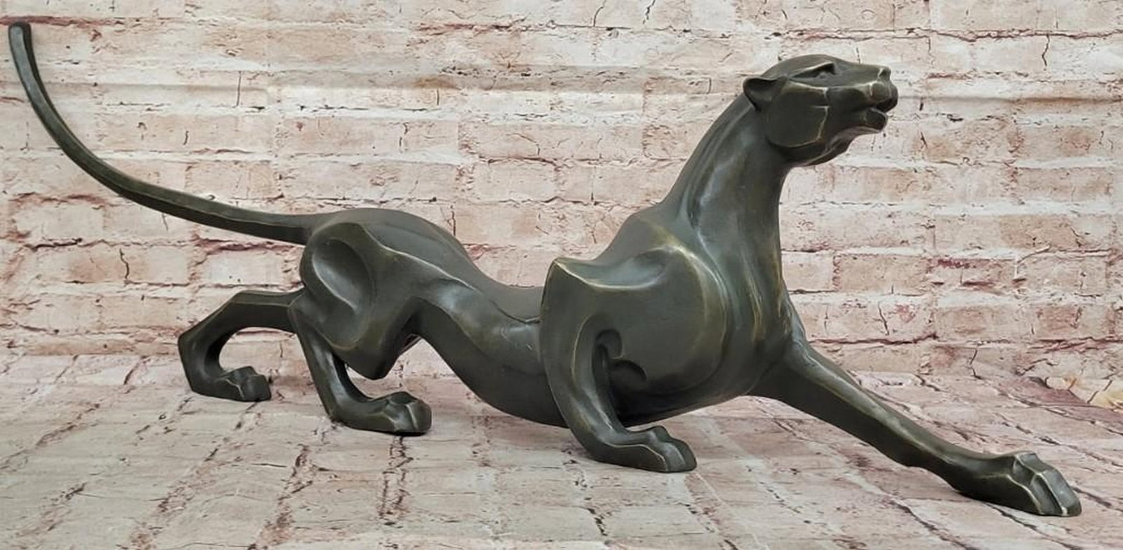 Sleek Pursuit: Bronze Panther Sculpture: Sleek Pursuit: Bronze Panther Sculpture Exuding power and elegance, this abstract bronze panther sculpture channels the bold geometry and streamlined form of Art Deco design. The feline's elongated bo