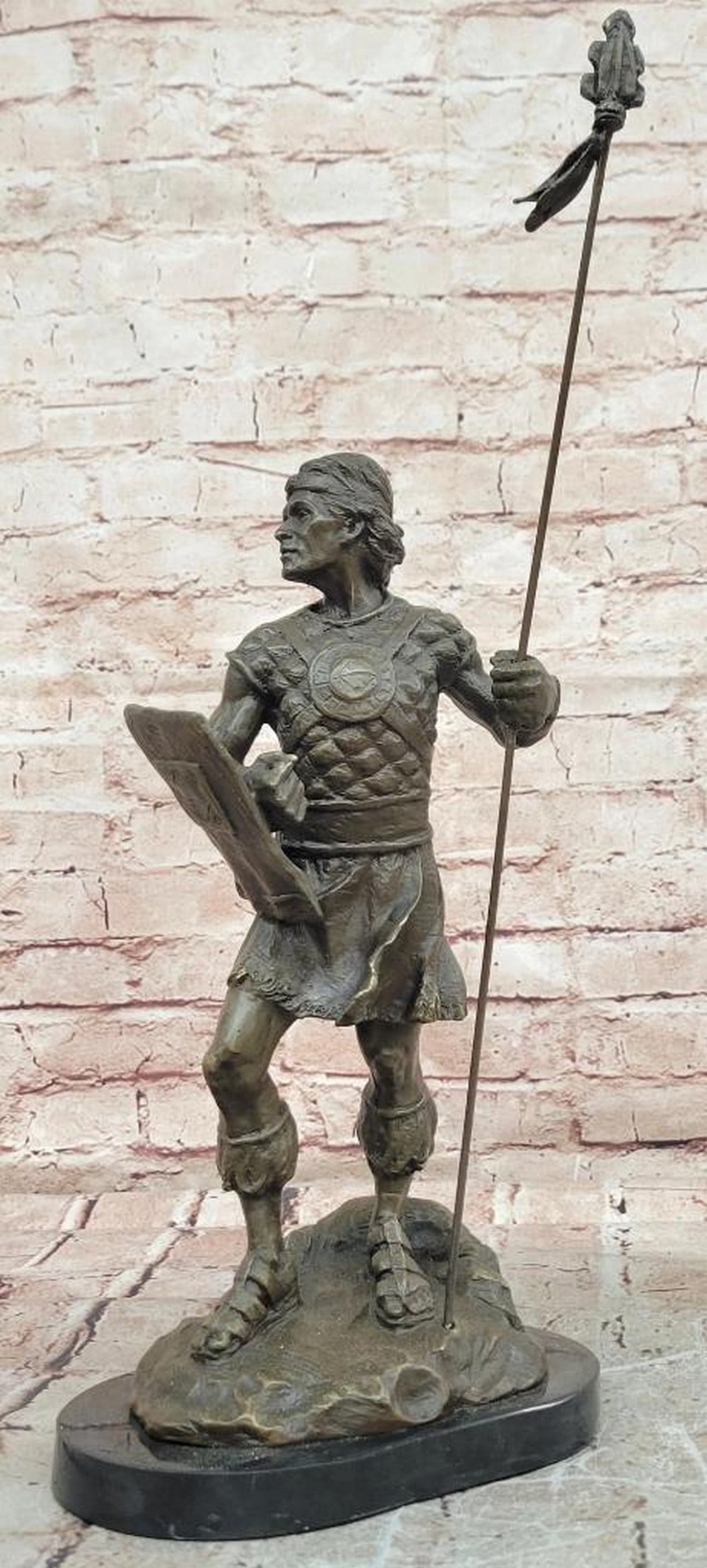 Celtic Warrior Original Bronze Statue - 18" x 7.5": Celtic Warrior Original Bronze Statue - 18" x 7.5" This original bronze statue depicts a Celtic warrior standing alert and prepared for battle, with detailed armor, weaponry, and musculature t